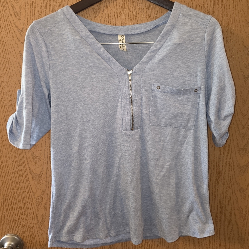 Light Blue V-Neck Top with Zipper Detail